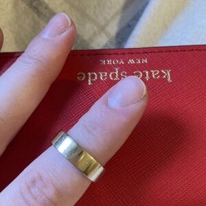 14k yellow gold wedding band, size 5